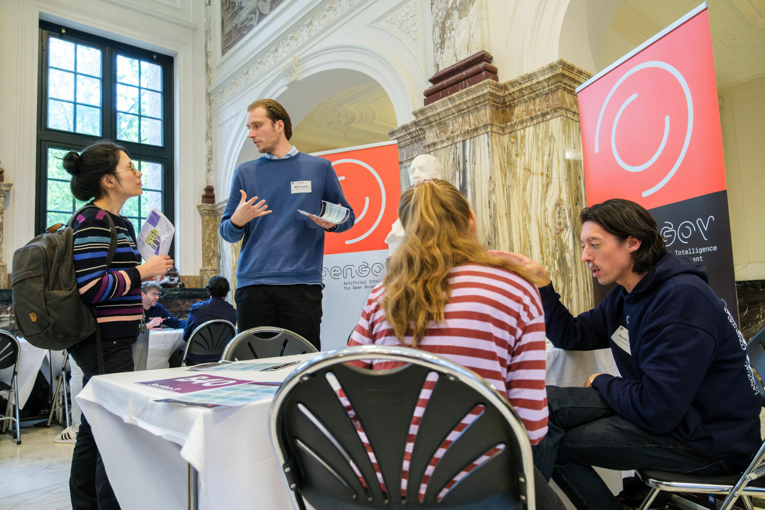 David & Maik in action, accompanied by our newly designed OpenGov banners!