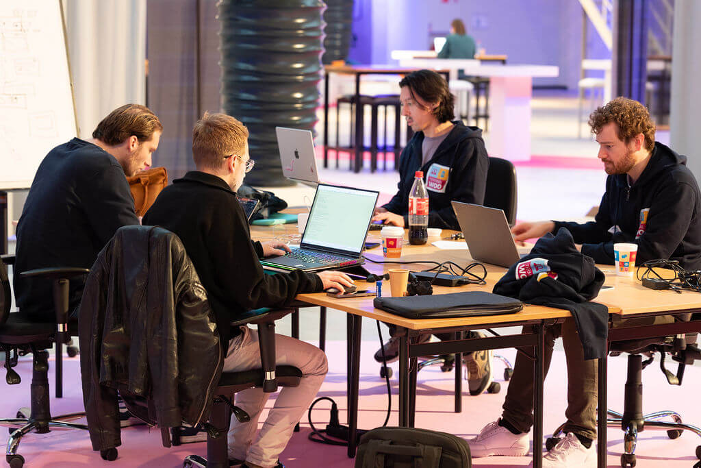 The team, very focused, at work while the time was running out 